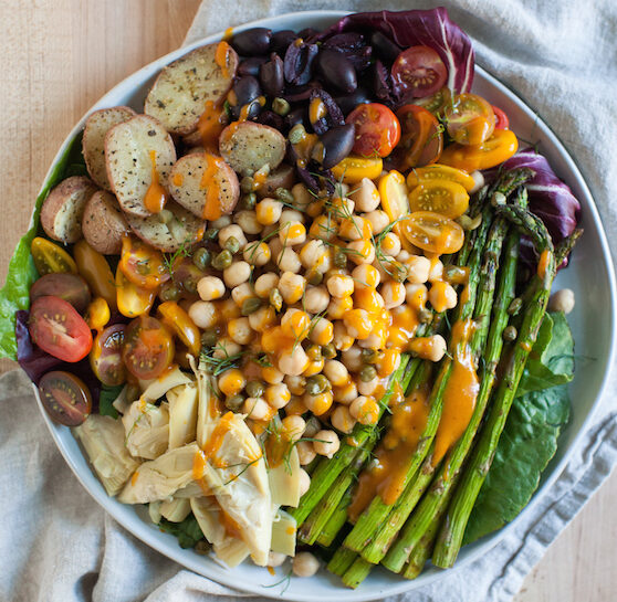 https://www.evoluerfitness.com/wp-content/uploads/2023/12/Vegan-Nicoise-Salad-2-e1703284735123.jpeg